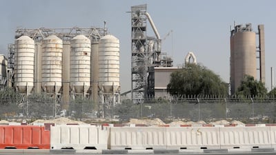The Dubai Competitiveness Report 2018 shows that the emirate is closing the gap with the world’s most competitive economies. It covers a range of economic indicators in sectors across manufacturing, transportation, warehousing, wholesale and retail trade, foreign trade, housing and foods. View of the National Cement Factory in Dubai's Al Quoz area. Pawan Singh / The National