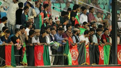 Afghanistan supporters watch their team play Zimbabwe during their T20 World Cup cricket match at the VCA stadium in Nagpur on March 12, 2016. / AFP / Prashant Bhoot