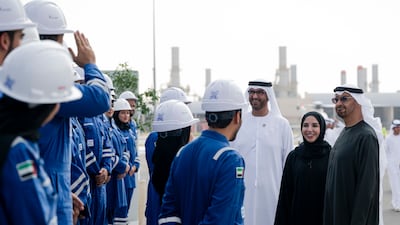 President Sheikh Mohamed with Adnoc employees after a board of directors meeting at the Habshan Complex. With him was Dr Sultan Al Jaber, Minister of Industry and Advanced Technology, and managing director and group chief executive of Adnoc. All photos: UAE Presidential Court