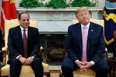 US President Donald Trump with Egyptian President Abdel Fattah El Sisi in the Oval Office in April. Mr Trump has offered to intervene to break the deadlock with Ethiopia over its construction of a massive upstream Nile dam. Evan Vucci / AP