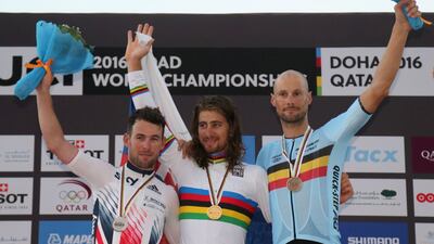 From left to right: Silver medallist Mark Cavendish, champion Peter Sagan and bronze medallist Tom Boone. Karim Jaafar / AFP