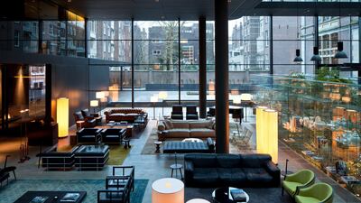 The glass-covered atrium acts as a 'living room' for guests and blends the outdoors with the hotel lobby. Courtesy Set Hotels.