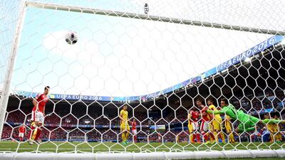 Admir Mehmedi of Switzerland scores his sides first goal during the UEFA EURO 2016 Group A match between Romania and Switzerland at Parc des Princes on June 15, 2016 in Paris, France. (Photo by Clive Mason/REMOTE/Getty Images)