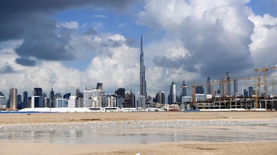 Dark clouds over the skyline of Dubai with Burj Khalifa, the world’s tallest building. AFP