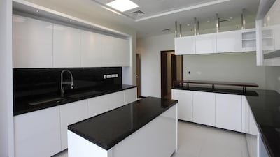A kitchen in one of the 21 penthouses of Aldar’s Gate Towers. Clint McLean for The National