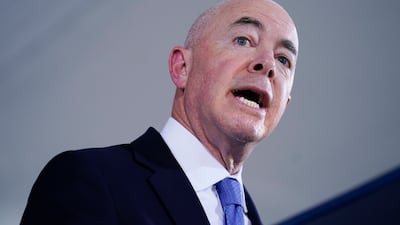 Homeland Security Secretary Alejandro Mayorkas is banned from crossing Russia's borders. AP