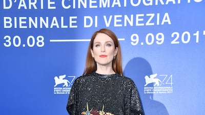 Julianne Moore, in Louis Vuitton, attends the 'Suburbicon' photocall during the 74th Venice Film Festival at Sala Casino on September 2, 2017 in Venice, Italy. Getty Images