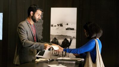 An intern welcoming a visitor to the pavilion (Courtesy: National Pavilion UAE)