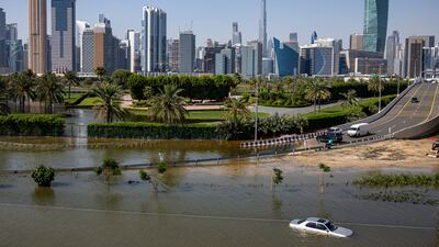 An abandoned vehicle submerged in floodwater following heavy rain in Dubai on April 16. AP