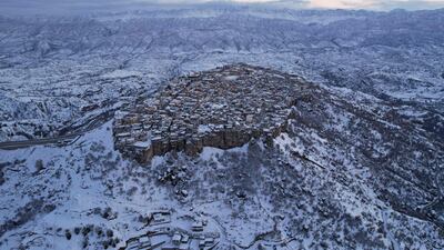Snow-covered mountains surround the town of Amadiyah, built at an altitude of 1,400 metres above sea level, about 75 kilometres north of the city of Dohuk in the semi-autonomous Iraqi Kurdistan region. AFP
