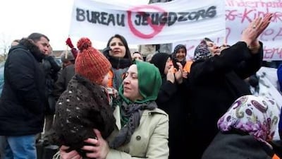 Turks demonstrate against the Dutch youth care policy in Lelystad on March 22. A diplomatic row over a Turkish boy fostered by Dutch lesbian parents clouded the Turkish prime minister Recep Tayyip Erdogan's visit to the Netherlands this month. Evert Ezlinga / AFP.