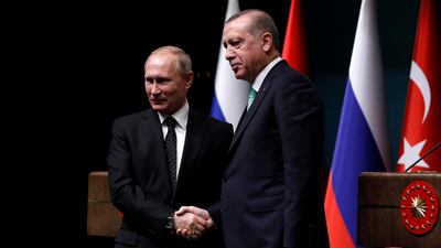 Turkish President Tayyip Erdogan shaking hands with Russian President Vladimir Putin after a news conference in Ankara, Turkey. Umit Bektas/ Reuters