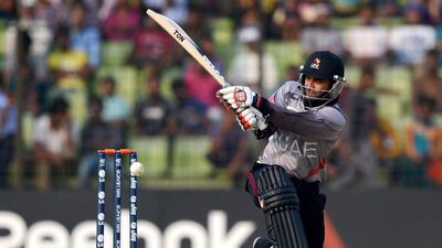 UAE batsman Khurram Khan plays a shot during the ICC T20 World Cup warm up cricket match between Bangladesh and the UAE earlier this year. Munir uz Zaman / AFP