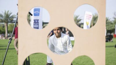 Children take part in the bag toss at The National Picnic in Umm Al Emarat Park.