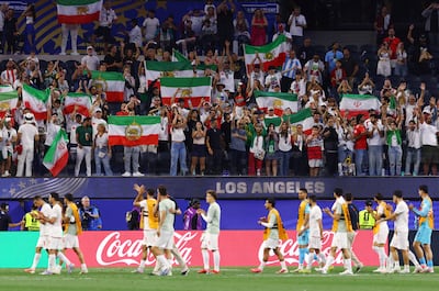 Iran fans celebrate after the match against New Zealand. Reuters