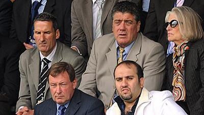 Sulaiman al Fahim, front right, sits alongside the Portsmouth chief executive Peter Storrie at Fratton Park yesterday.