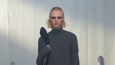 A tabbard dress over skinny-fit trousers at Helmut Lang. Photo: Helmut Lang