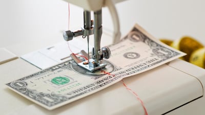 Use the new year as a chance to resolve any money issues you may have. Getty Images/Tetra images RF