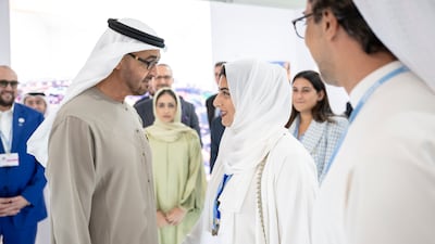 Sheikh Mohamed speaks with Sheikha Shamma bint Sultan. Rashed Al Mansoori / UAE Presidential Court