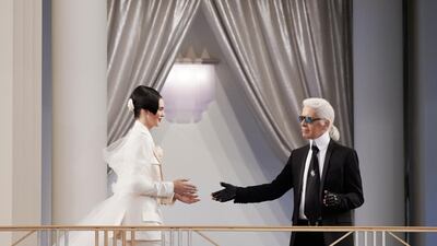 Model Kendall Jenner and Lagerfeld at the Chanel show in Paris in 2015. Photo: Olivier Saillant