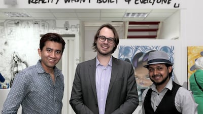 From left, Irfan Khairi, Peter Gould and Ruh al-Alam. Jeffrey E Biteng / The National