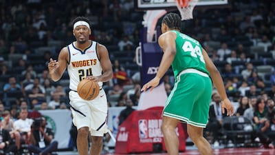 Jalen Pickett of Denver Nuggets carries the ball during the NBA Abu Dhabi Games. Victor Besa / The National