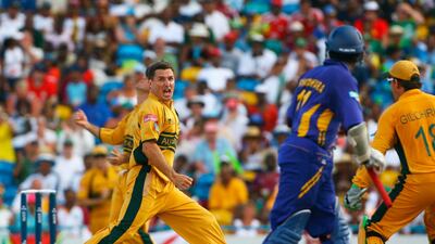 Brad Hogg of Australia celebrates the wicket of Kumar Sangakkara. Getty