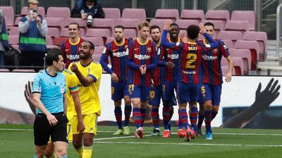 Lionel Messi celebrates with team-mates after scoring. EPA