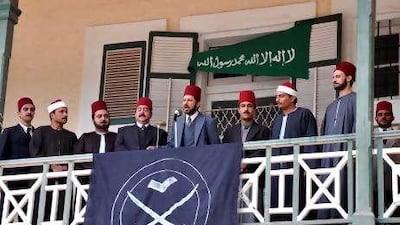 The Jordanian actor Eyad Nassar, centre, portrays the Muslim Brotherhood founder Hassan al Banna in a scene from Al Gama'a. The controversial series was written by screenwriter Wahid Hamed, below.