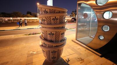 'Teacups' by Martin Kot, is one of the art works installed next to the bus stops on Jumeirah beach road in Dubai. Pawan Singh / The National