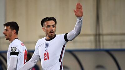 Jack Grealish celebrates after his striker. AFP