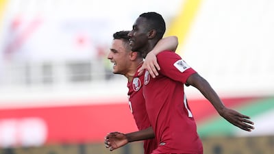 Almoez Ali celebrates after scoring to give Qatar a 4-0 lead. EPA