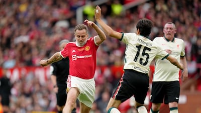 United's Karel Poborsky battles for the ball with Liverpool's Yossi Benayoun. PA