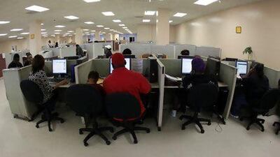 Job seekers browse the Web at a career centre in Miami, Florida. Eliot Schechter / Bloomberg News