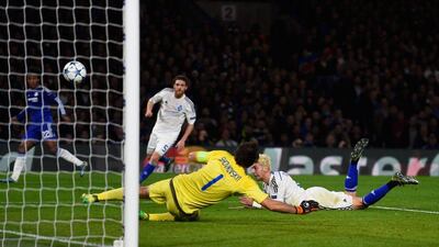 Aleksandar Dragovic, ground, of Dynamo Kiev scores an own goal to give Chelsea a 1-0 advantage in their Champions League match on Wednesday night. Mike Hewitt / Getty Images