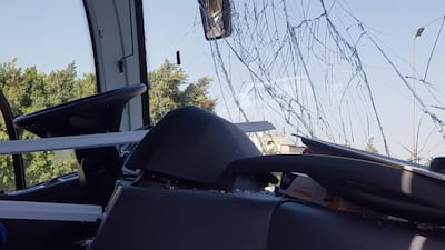 A damaged bus is seen at the site of a blast in Cairo.