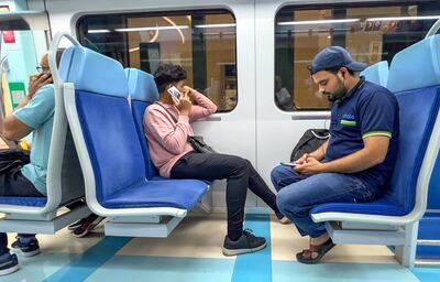 Dubai Metro has carried 2.527 billion passengers since it launched in 2009 to the end of 2024. Victor Besa / The National