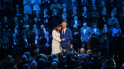 Mr Farage embraces former Conservative home secretary Suella Braverman, who had defected to Reform, in London, in January 2026