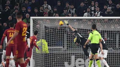 Juve goalkeeper Gianluigi Buffon cannot stop Roma forward Cengiz Under (not in picture) from scoring. AFP