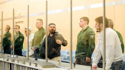 The trial for the Sauerland Group, whose 2007 bomb plot was foiled by German security services. The terror group, composed of two German-Turkish and two German Al Qaeda recruits including Adem Yilmaz, centre, were tried for plotting attacks against US interests. All four were found guilty. Kirsten Neumann / Getty Images