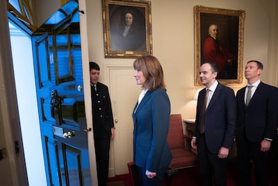 Chancellor Rachel Reeves is followed by Treasury team members as she prepares to leave 11 Downing Street to deliver her budget. AP