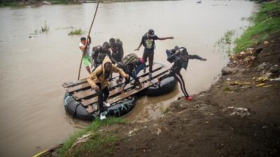 Migrants cross the Suchiate river, in Chiapas, Mexico, 31 May 2019. EPA