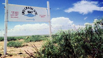 A sign off route US 285, north of Roswell, New Mexico, points west to the alleged 1947 crash site of a UFO.