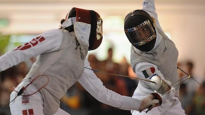 Ines Boubakri, left, up against Granbassi Margherita in the semi-final match at the Mediterranean Games in Italy. Getty