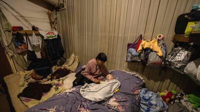 A woman takes care of a baby at a shelter in the Ukrainian city of Severodonetsk in Donbas region. AFP