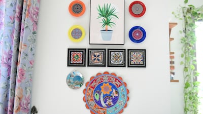 Other walls are filled with old coasters and the wooden covers of cookies jars