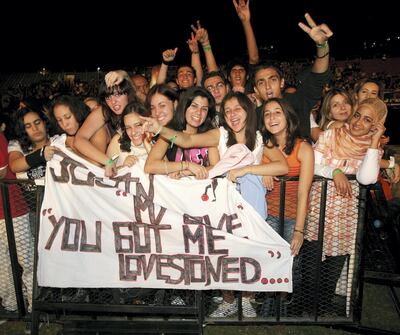 Fans watch Justin Timberlake perform. Getty Images