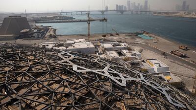 A view of Louvre Abu Dhabi's dome and the beginning stages of cladding work, as workers prepare to lift the last super-sized elements into place in September 2014. Silvia Razgova / The National