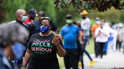 Tamara Ross waits in line on the first day of early voting for the general election at the C.T. Martin Natatorium and Recreation Center in Atlanta, Georgia. AFP
