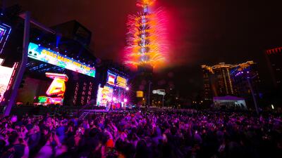Fireworks and light effects illuminate the night sky from the Taipei 101 skyscraper during New Year's celebrations in Taiwan. EPA